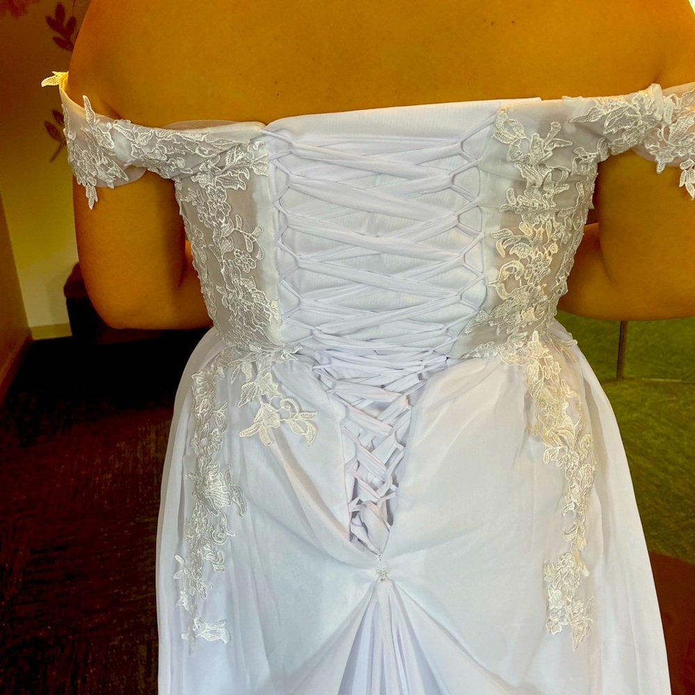 Size 10-12 bustled and hemmed to 5’1 beautiful dress, gained too much weight